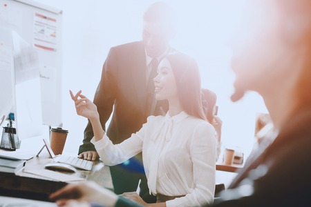 Team of Managers Working in Modern Call Center. Manager with Computer. Businessman on Workplace. Consultant with Microphone. Customer Service Concept. Woman in Headphones. Operator in Office.の写真素材