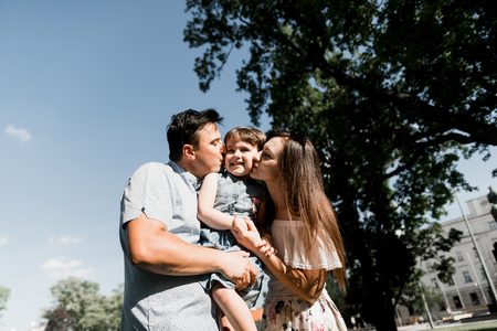 Smiling happy family and young funny daughter. Family concept.の写真素材