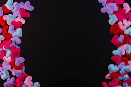 A lot of little hearts on a black backgroundの写真素材