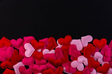 A lot of little hearts on a black backgroundの写真素材