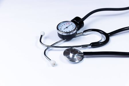 Blood pressure monitor. Medical sphygmomanometer for blood pressure control isolated on whiteの写真素材