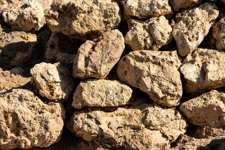 Old and weathered large stone blocks wall texture