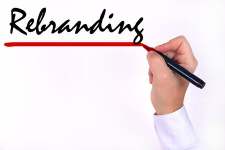 Hand writing inscription Rebranding up with marker conceptの写真素材
