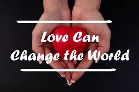 Inspirational quote on a natural landscape background. Love Can Change the World.の写真素材