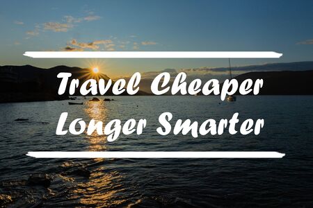 Inspirational quote on natural background.Travel Cheaper Longer Smarter.