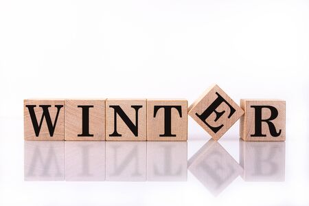 The word Winter on wooden cubes. Concept Seasons of year.の写真素材