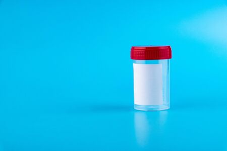 Sterile transparent blank plastic container for analysis. Red lid. Sterile medical container for...