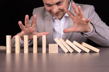 Concept of property protection, construction, mortgages. Businessman, agent protects against crisis....