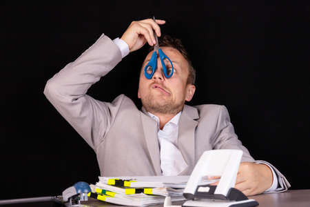 Businessman in a situation of crisis, bankruptcy, ruin, default. Concept.