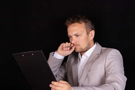 Accountant works with documents for paying taxes. Business idea.の写真素材