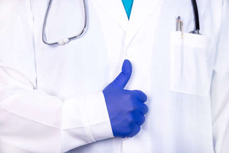 Doctor Urologist. A doctor in medical gloves shows with a gesture that everything is fine. medical...
