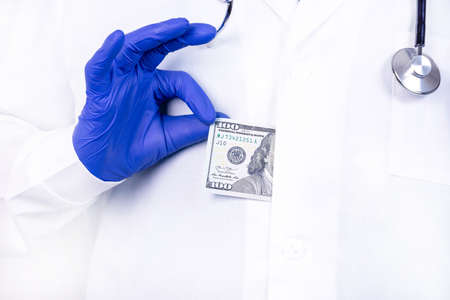 Concept of Bribe, thanks to the doctor for the services provided.の写真素材