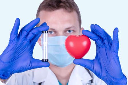 Human silence, corruption. Concept. Doctor in a medical mask and money near the mouth.