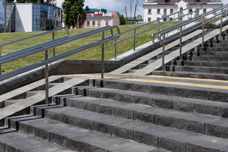 Pedestrian road and steps for the disabled in the city.