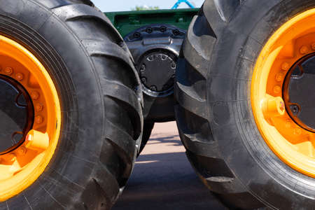 Low angle view of wheels of heavy truckの写真素材
