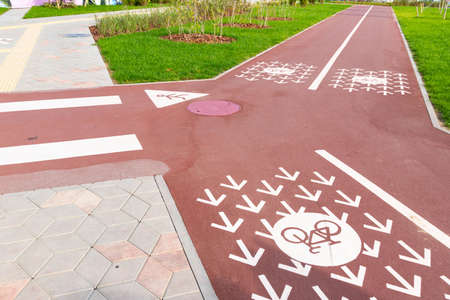 New groomed wide modern bike and pedestrian paths two lanes of opposite directions. Bicycle lanes...