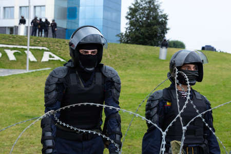 Minsk, Belarus - September 20, 2020: an elite police officer protects the area from protesters.のeditorial素材