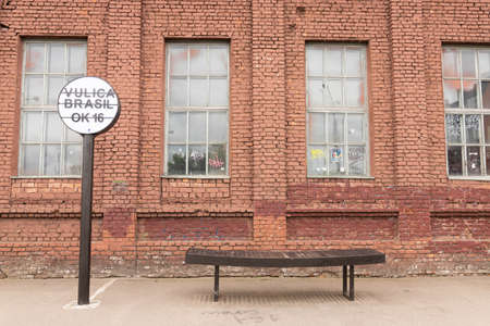 Minsk, Belarus - September 30, 2020: The exterior facade of a brick house with large leaded windows.のeditorial素材