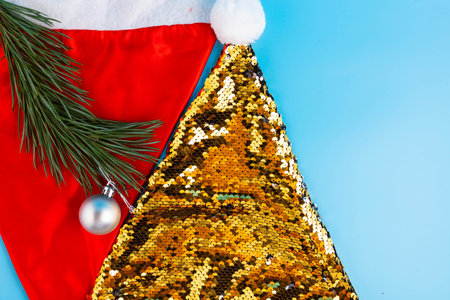 Santa hat on a blue background, Christmas decorations.の写真素材