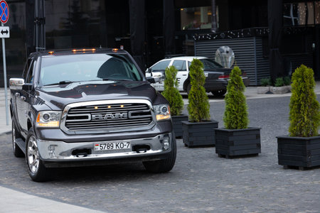 Minsk, Belarus - November 3, 2020: Hilton hotel. Dodge Pickup RAM 1500 American police car.
