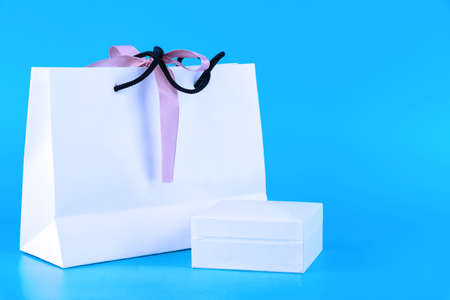 White paper bag and box mock up, shopping paper bag and box for card or certificateの写真素材