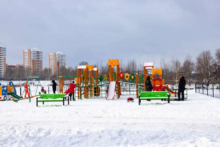 Children playground on a frosty winter day.の写真素材