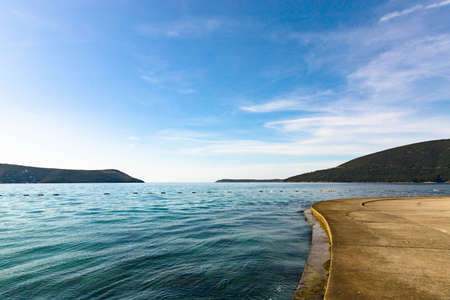 Beautiful view of the mountains in the Bay of Kotor on a sunny morning, Montenegro. Adriatic Sea.の写真素材