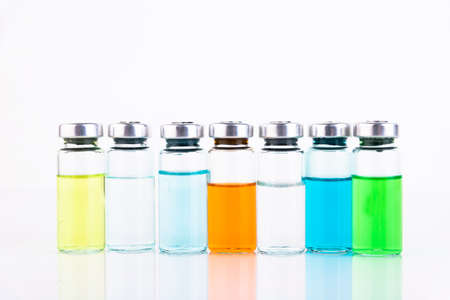 Many ampoules of different colors. Medicine concept. Background. Copy space.