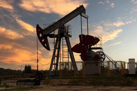 Oil industry. Oil rigs. oil pumps at sunset. Copy space.