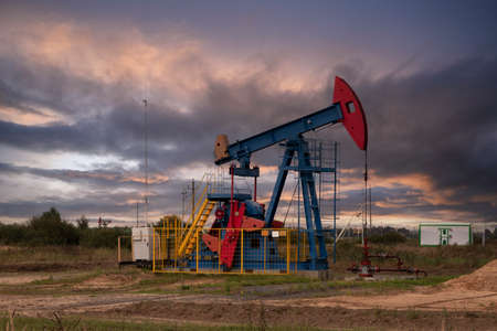 Oil industry. Oil rigs. oil pumps at sunset. Copy space.の写真素材