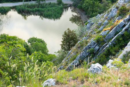 Mountain lake with gray rocks, top view. Landscape.の写真素材