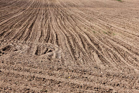 Sowing time, plowed land, rows of plowed land prepared for sowing.の写真素材