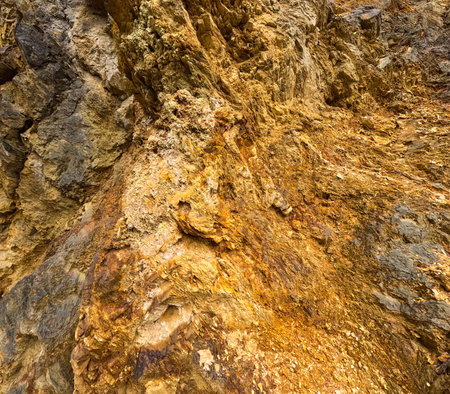 Red colored rock surface texture, erosion, background.
