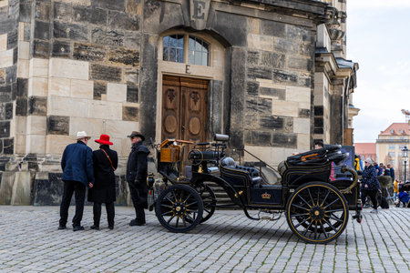 Dresden, Germany, April 5, 2025. A self-propelled carriage for tourists on the streets of the ancient German city of Dresden.の写真素材