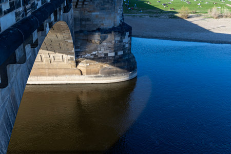 Dresden, Germany April 5, 2025. Elbe River and a beach with vacationing tourists. Dresden, Germany.の写真素材