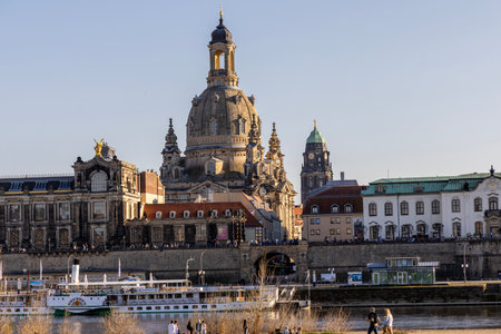 Dresden, Germany, April 5, 2025. Panoramic view of the city of Dresden and the Elbe river embankment with a vintage steamship.の写真素材