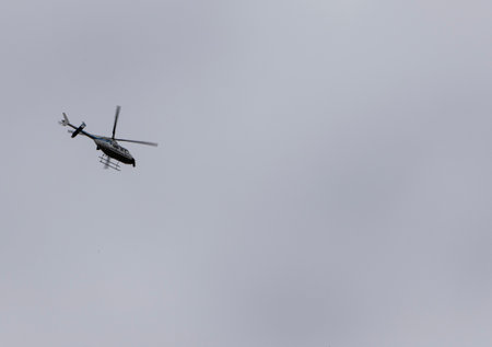 Police helicopter in the sky over Wroclaw. Copy space.の写真素材