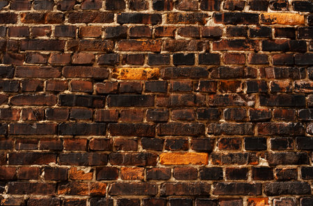 Brick wall. Red burnt brick. Background or texture of blocks of different colors.