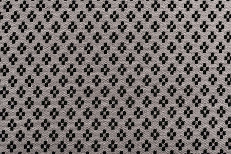 Background from fabric with a small pattern. Material for tailor, seamstress and fashion designer...