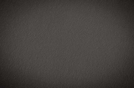 Background in gray material with vignetting. Dark shade fabric