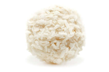 Candy of white cream chocolate in coconut, isolated on white background. Full sharpnessの写真素材