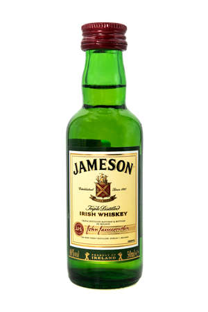 Jameson whiskey on a white background. Whiskey bottle isolate of the famous Irish brandのeditorial素材