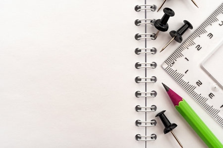 The pencil lies on a notebook with garbage after it has been sharpened. Place for an inscription or drawing. stationeryの写真素材