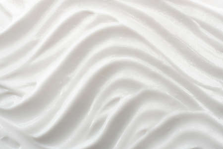 Texture of white cosmetic cream. Moisturizing cream background for dry skin care