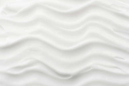 Texture of white cosmetic cream. Moisturizing cream background for dry skin careの写真素材