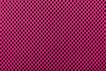 Violet or magenta fabric. Background from colored material. Texture of red colorの写真素材