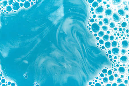 Soap bubbles background. Shampoo foam. Bubbles in the waterの写真素材