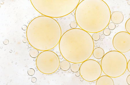 Drops of fat in water. Bubbles of fat close upの写真素材