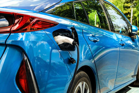 Electric car at the charging station. Ecology. Eco friendly transport