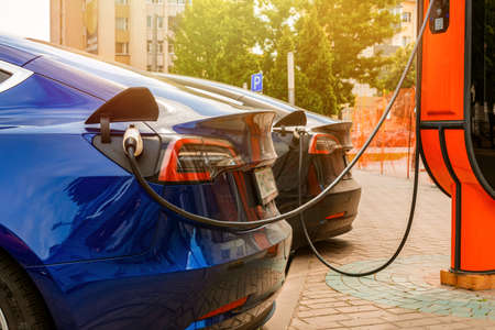 Electric car at the charging station. Ecology. Eco friendly transport